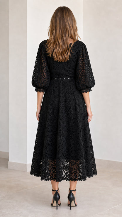 Back view of black A-line floral lace midi dress