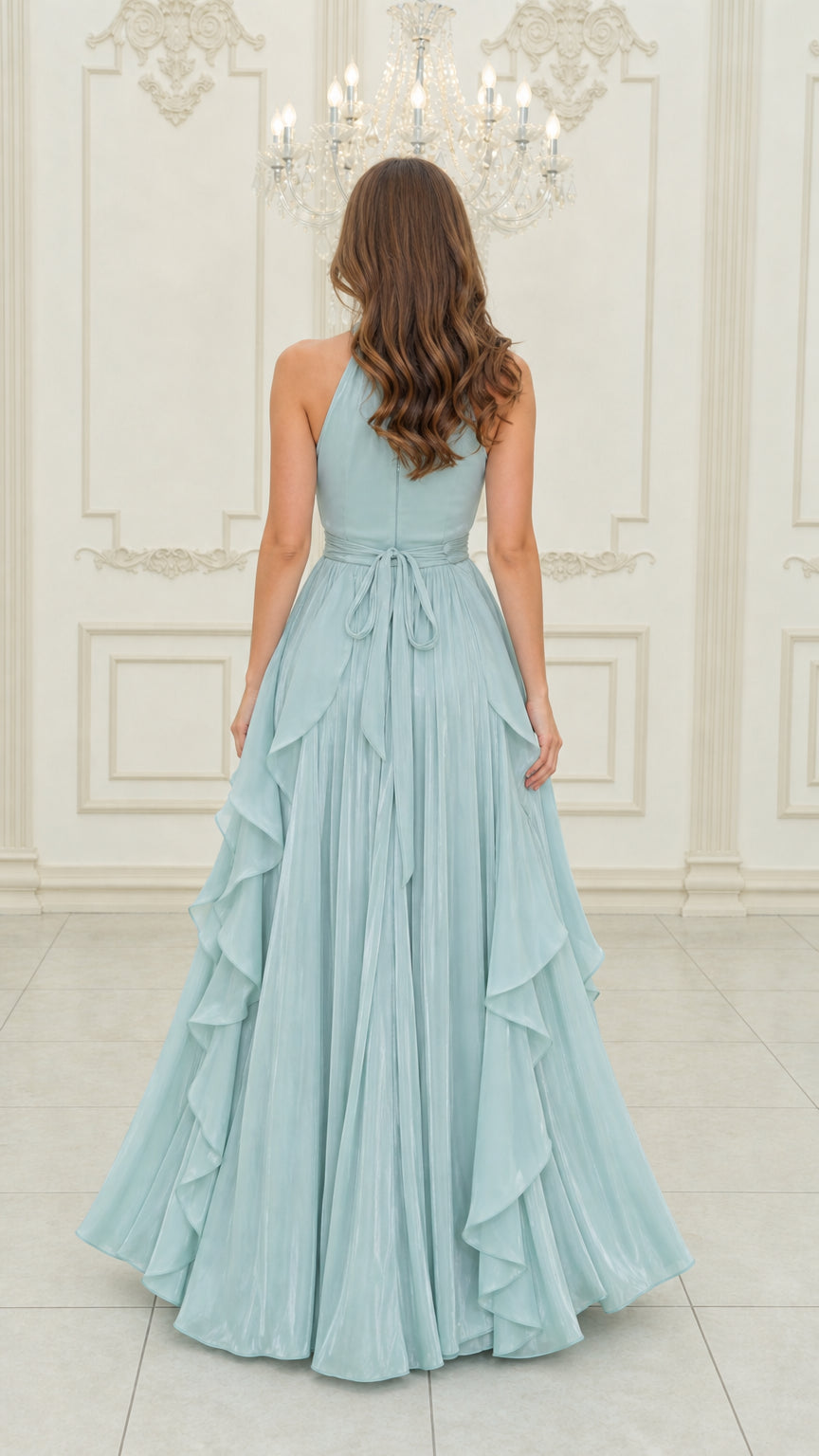 Back view of light blue halter gown showing back silhouette and waist tie