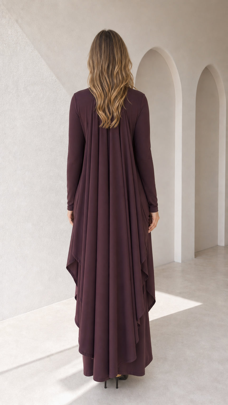 Back view of plum maxi dress displaying elegant cape drape detail