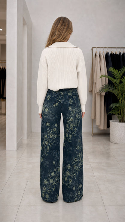 Back view of woman wearing Denim Blue floral embroidered high waist wide leg pants