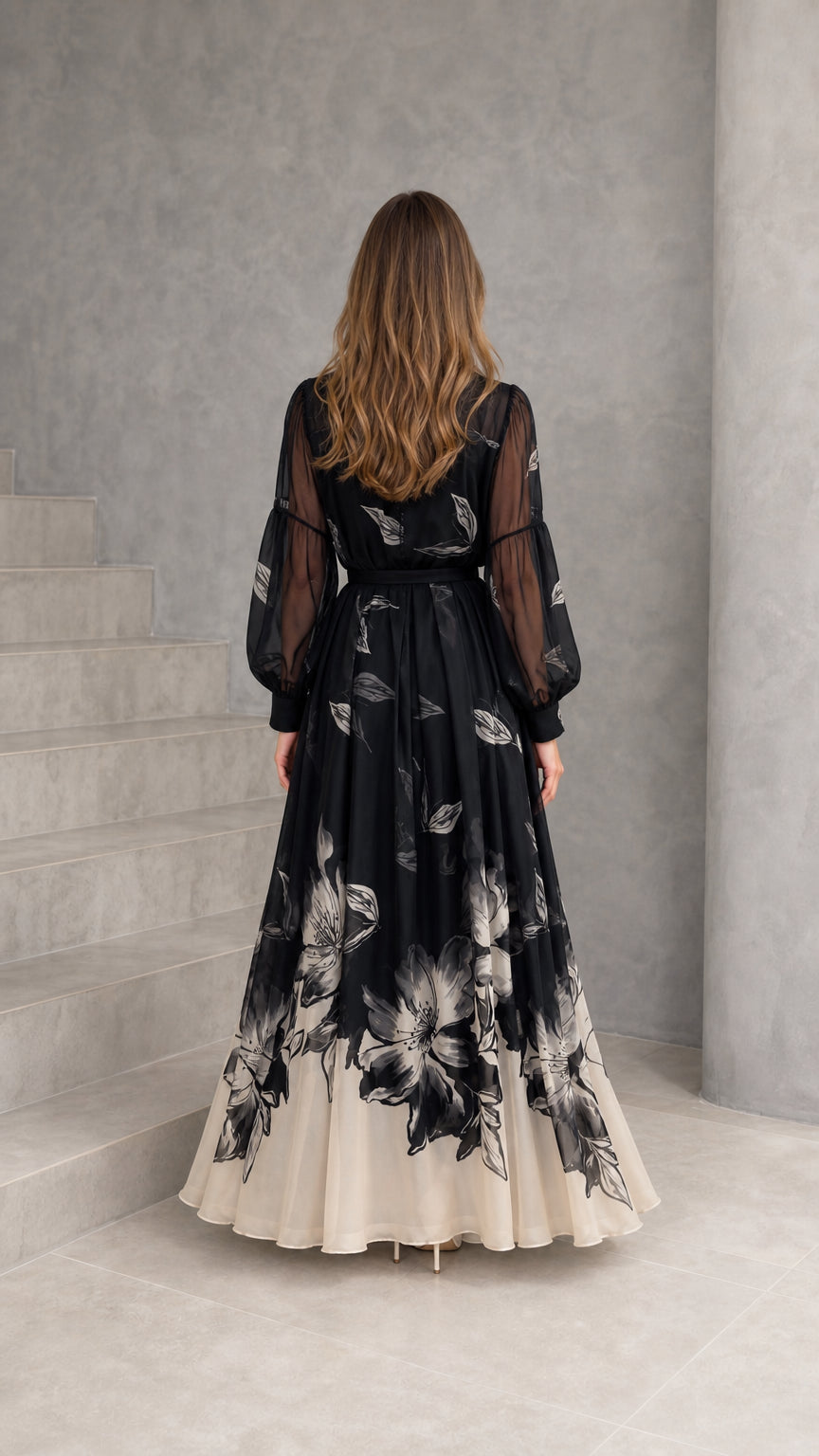 Back view of black and cream ombre floral long sleeve maxi dress