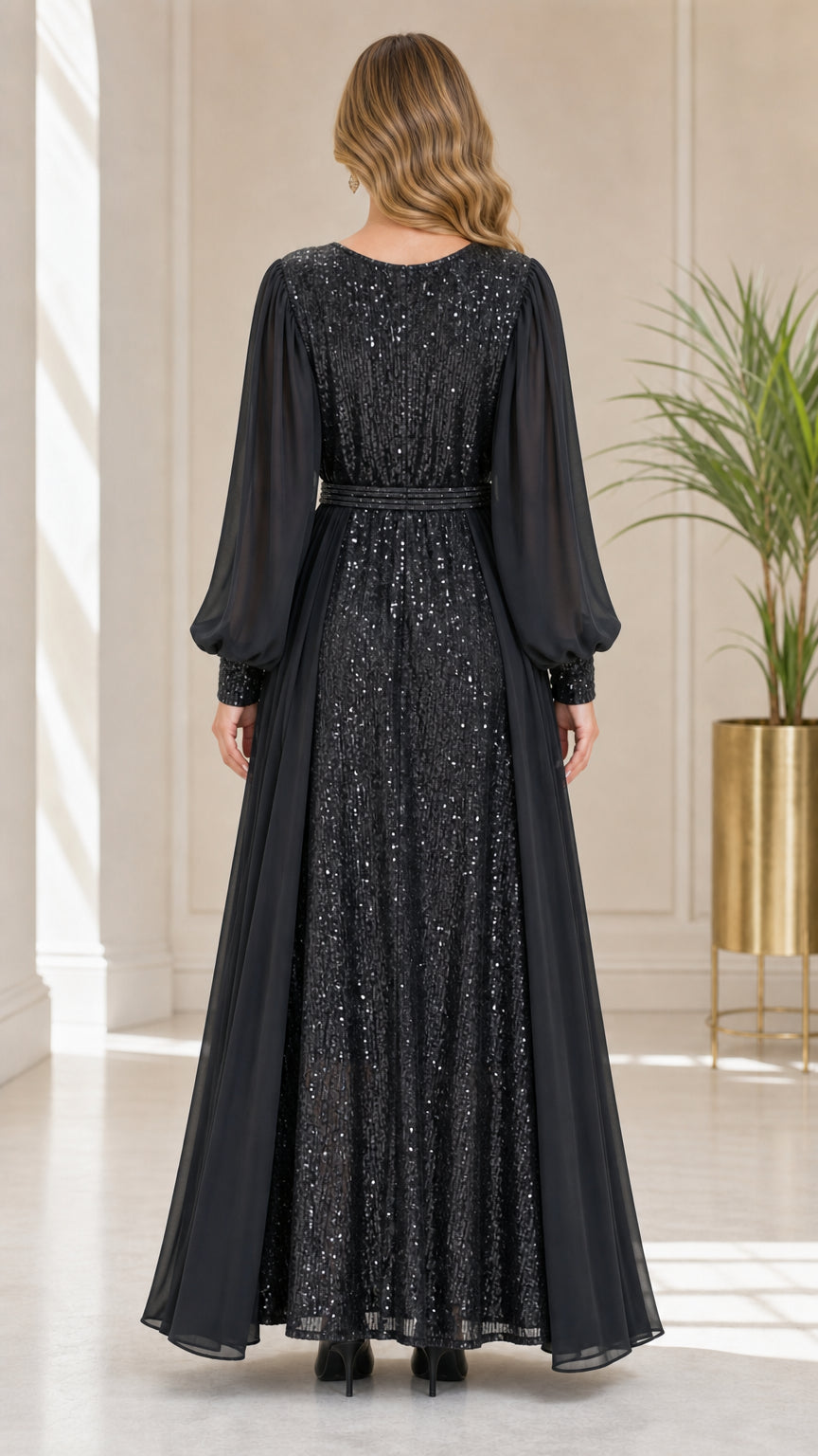 Back view of model wearing black sequin long sleeve evening dress