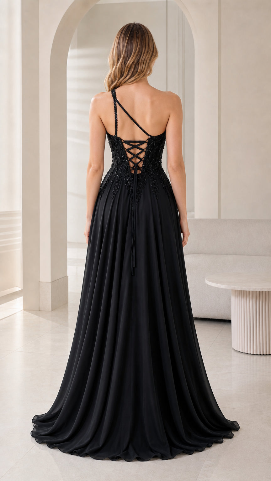 Back view of black floor-length evening gown showing lace-up corset detail