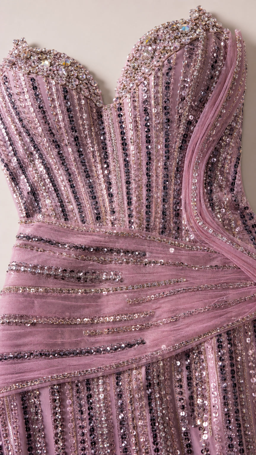 Close-up detail of embellished sweetheart bodice with sequins and draped tulle