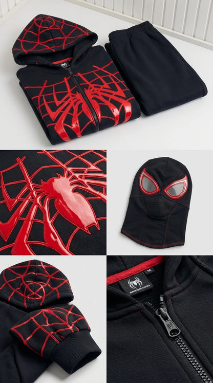 Flat lay close-up details of black graphic zip-up hoodie, zipper, and matching balaclava accessory