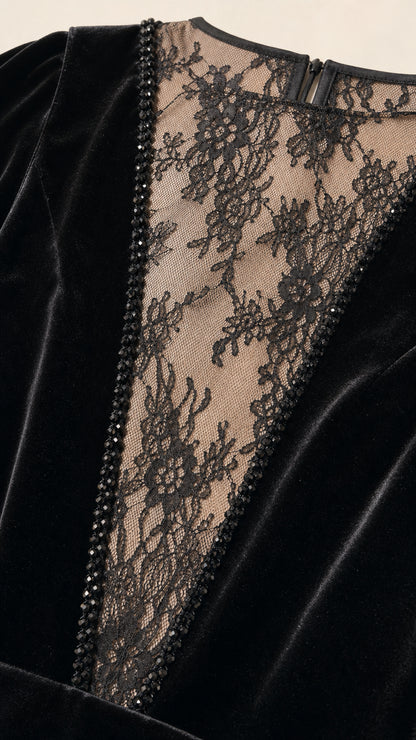 Close-up detail of sheer floral lace panel with delicate beading and velvet texture