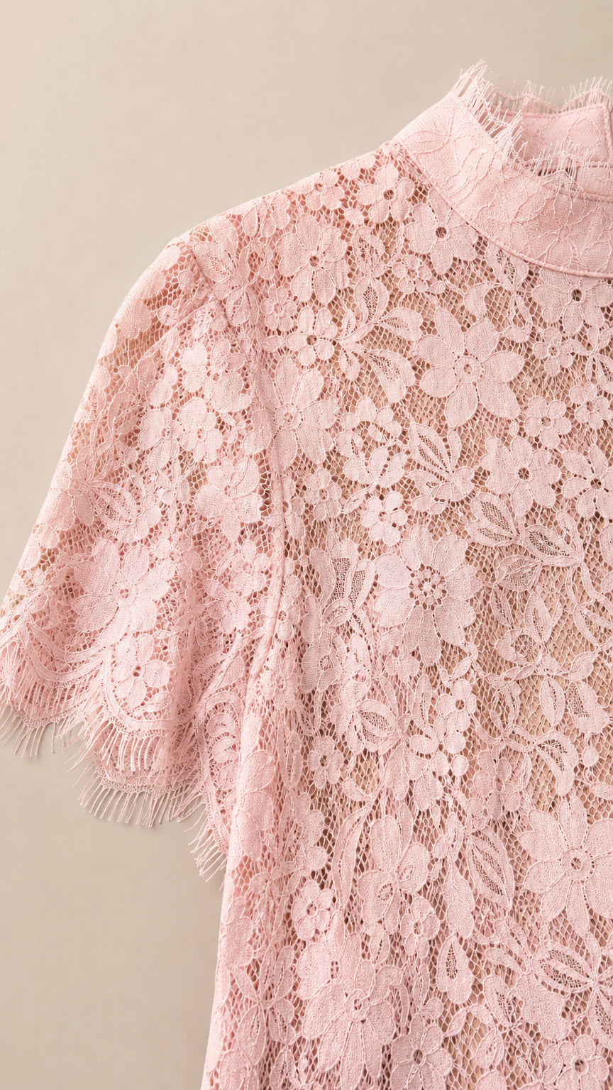 Close-up detail of Blush Pink floral lace bodice and scalloped sleeve hem