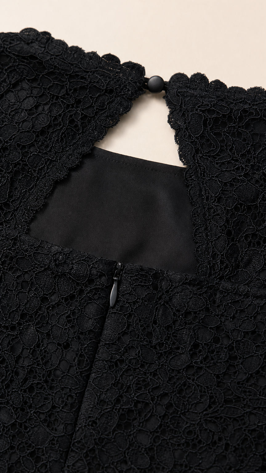 Close-up detail of black lace back keyhole and hidden zipper closure