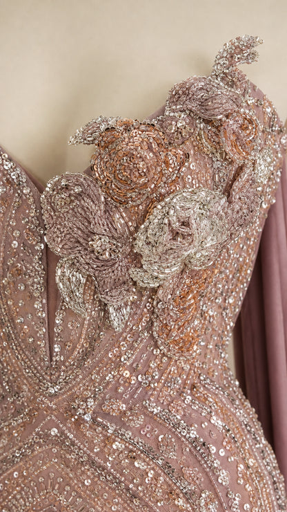 Close-up of 3D beaded floral applique embroidery and intricate sequin detailing