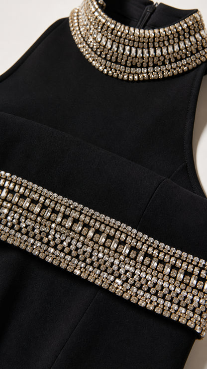 Close-up detail of multi-row crystal rhinestones on collar and trim