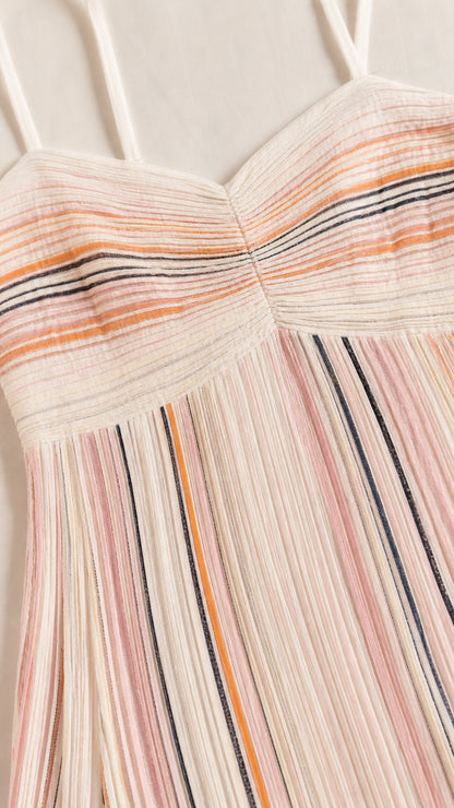Close-up detail of textured fabric and gathered sweetheart neckline on Cream Multi striped dress