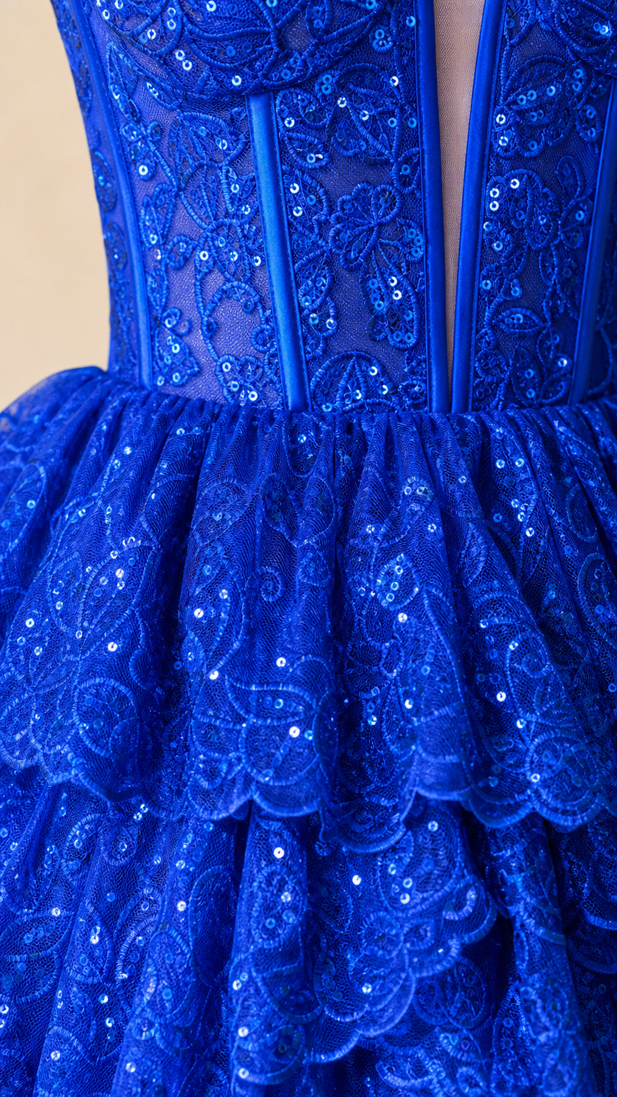 Close-up detail of Royal Blue sequin floral lace and boned corset bodice with mesh insert