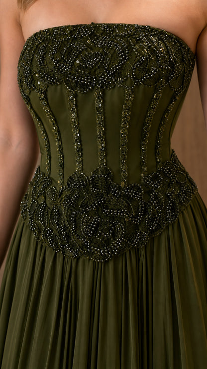 Close-up detail of olive green boned corset bodice with intricate beading