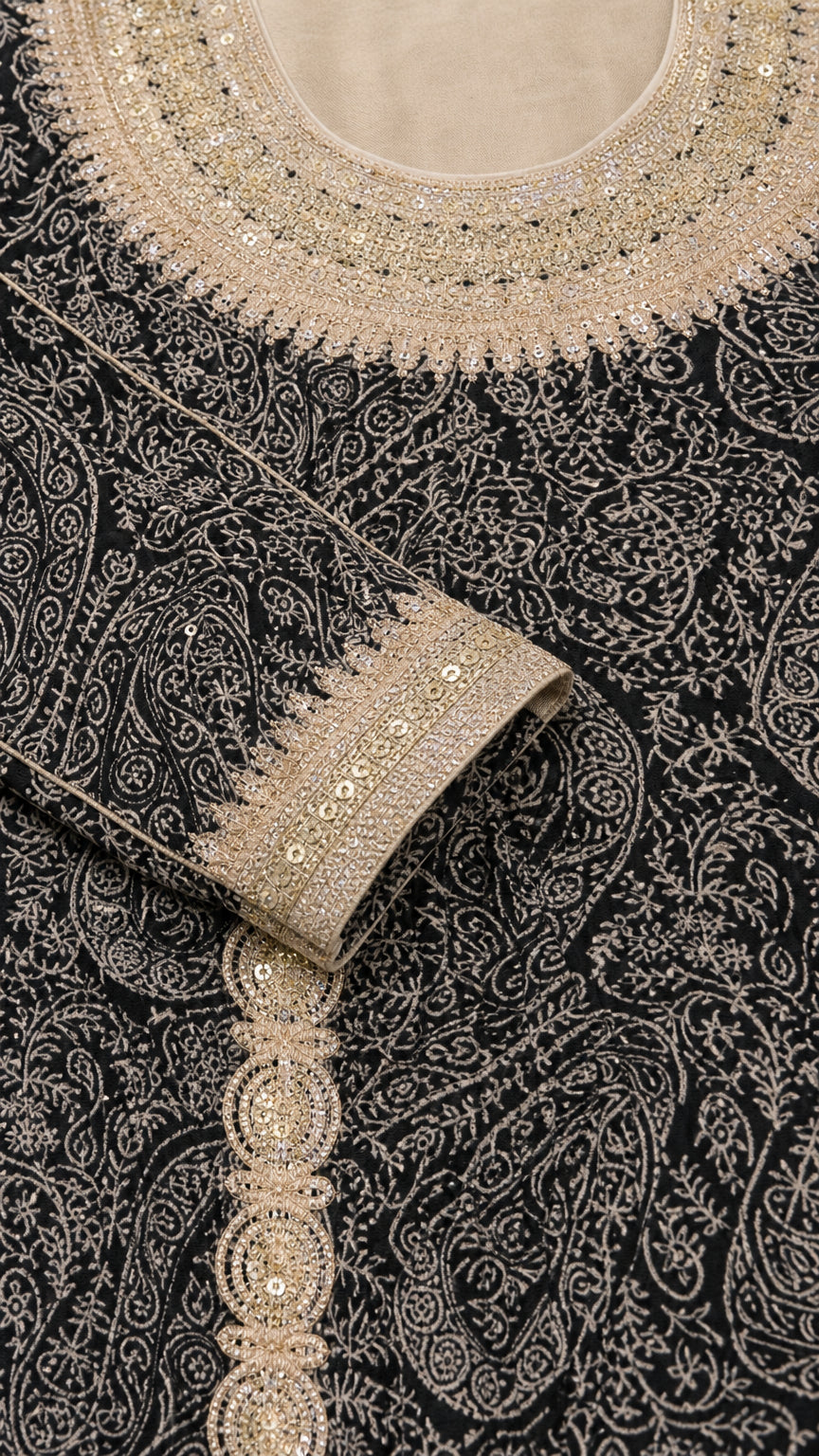 Close-up detail of neckline, cuff, and front vertical shimmering embellished trim