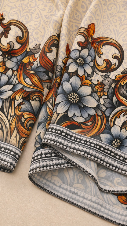 Close-up detail of baroque floral print border and smooth fabric texture