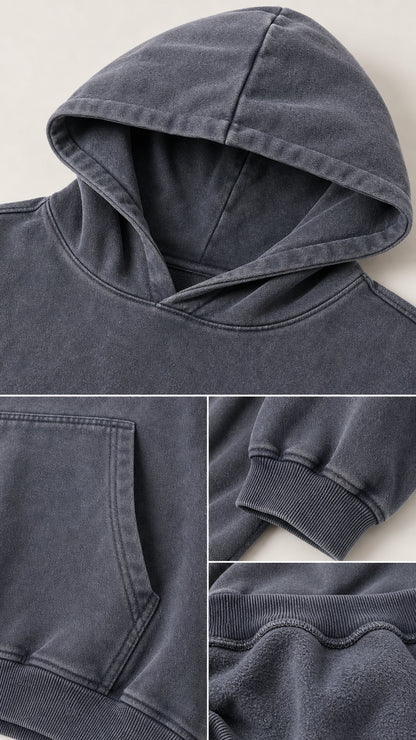 Close-up detail of hoodie neckline, kangaroo pocket, ribbed cuffs, and soft fleece lining