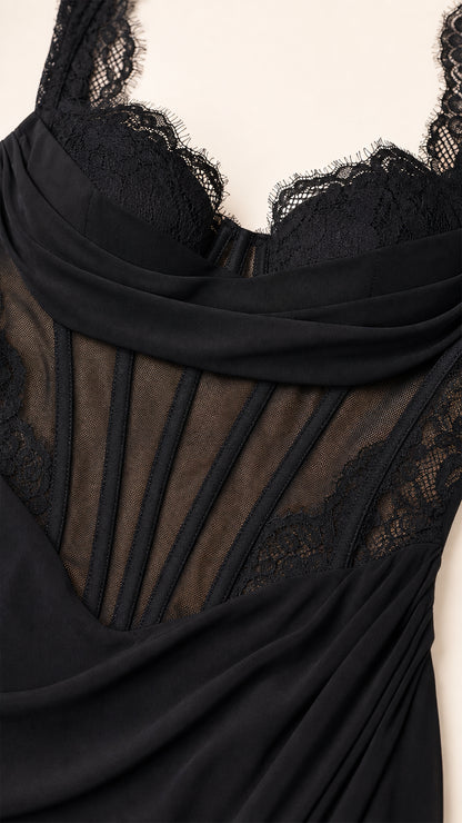 Close-up detail of sheer boned corset bodice and eyelash lace trim