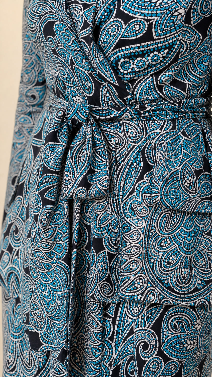 Close-up detail of Teal Blue paisley fabric texture, collar, and tied waist belt