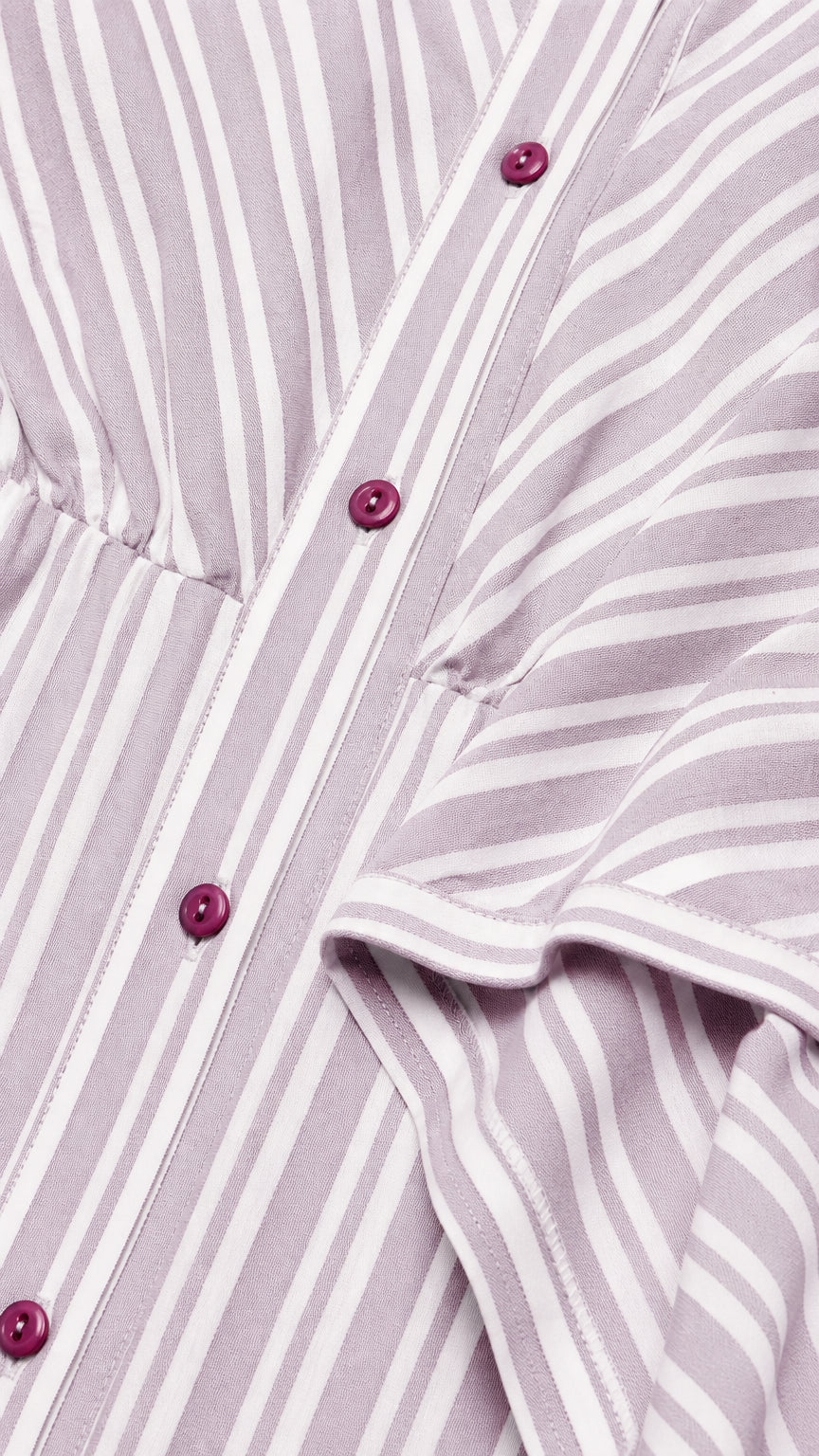 Close-up detail of lavender striped fabric, collar, and button placket