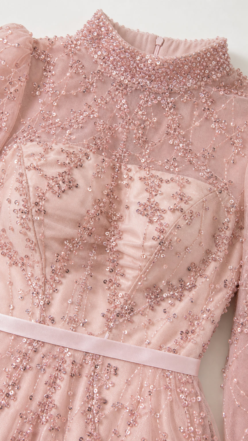 Close-up of beaded high neck and sequin embellishments on blush pink bodice
