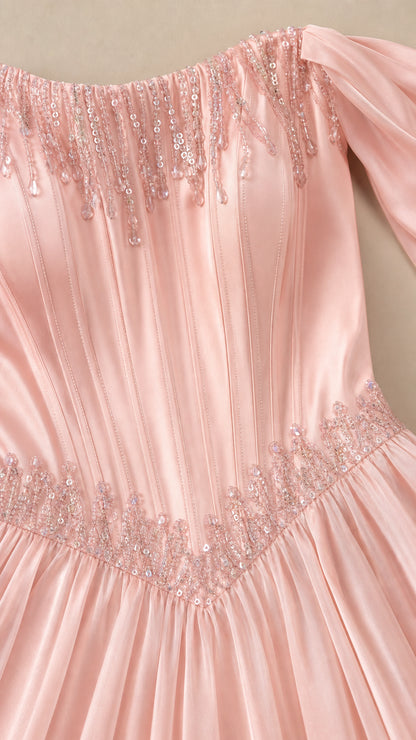 Close-up of beaded embellishments and boning on blush pink bodice