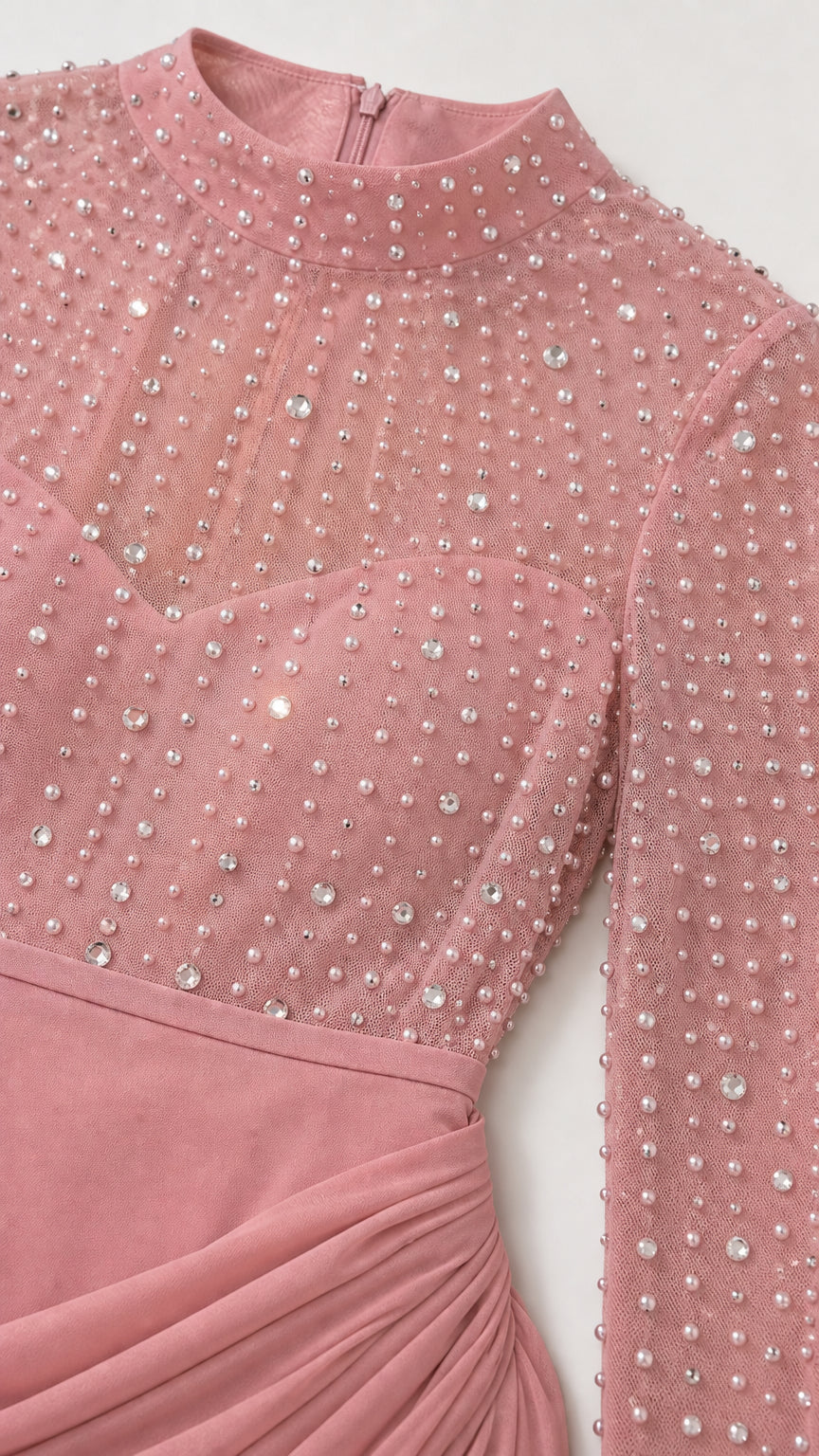 Close-up of sheer high neck bodice with delicate rhinestone embellishments in dusty rose