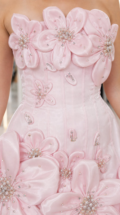 Close-up detail of Light Pink 3D floral appliques and beaded embellishments on bodice