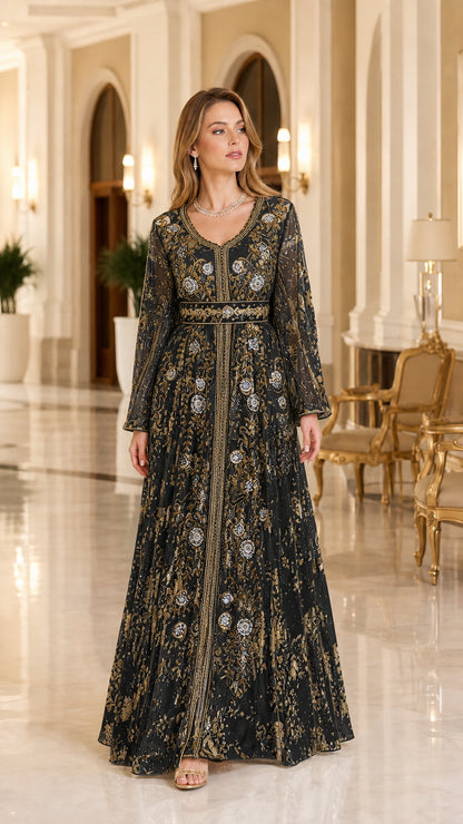 Model wearing black and gold metallic embroidered long sleeve evening kaftan dress