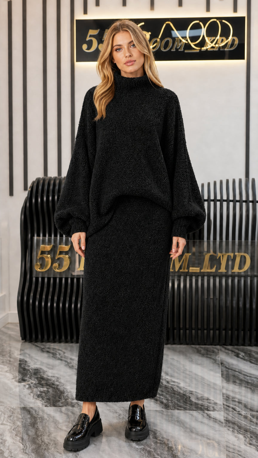 Model wearing Black mock neck lantern sleeve sweater and matching maxi skirt set