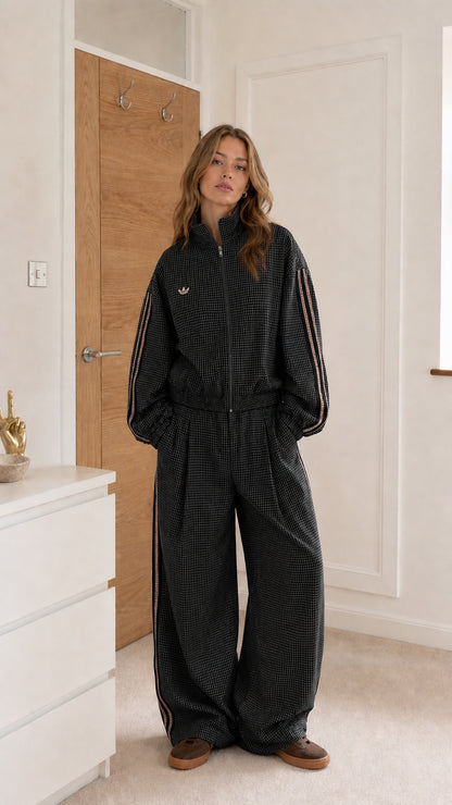 Black gingham women's track stripe jumpsuit shown from the front