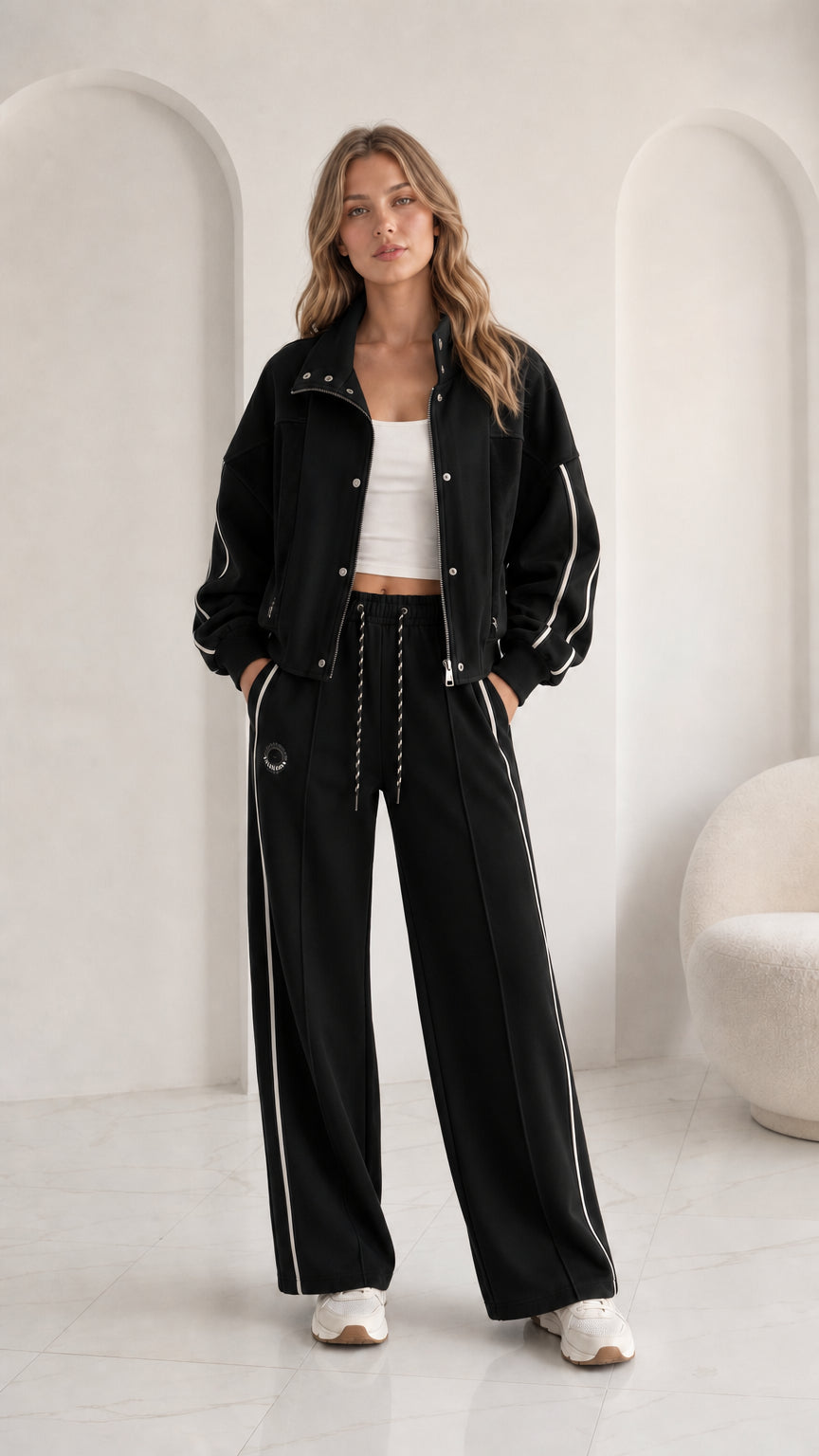 Women's black 2-piece tracksuit set with contrast white stripes