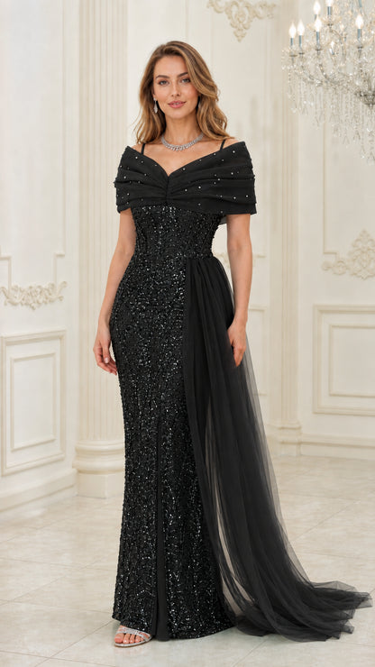 Front view of woman wearing black off-the-shoulder sequin evening dress