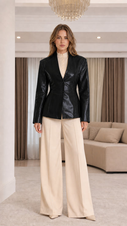 Front view of model wearing Classic Black collarless faux leather blazer