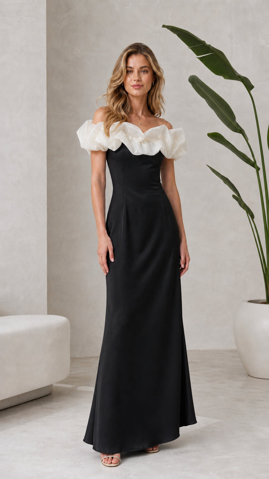 Black off-the-shoulder maxi dress with cream contrast ruffle neckline