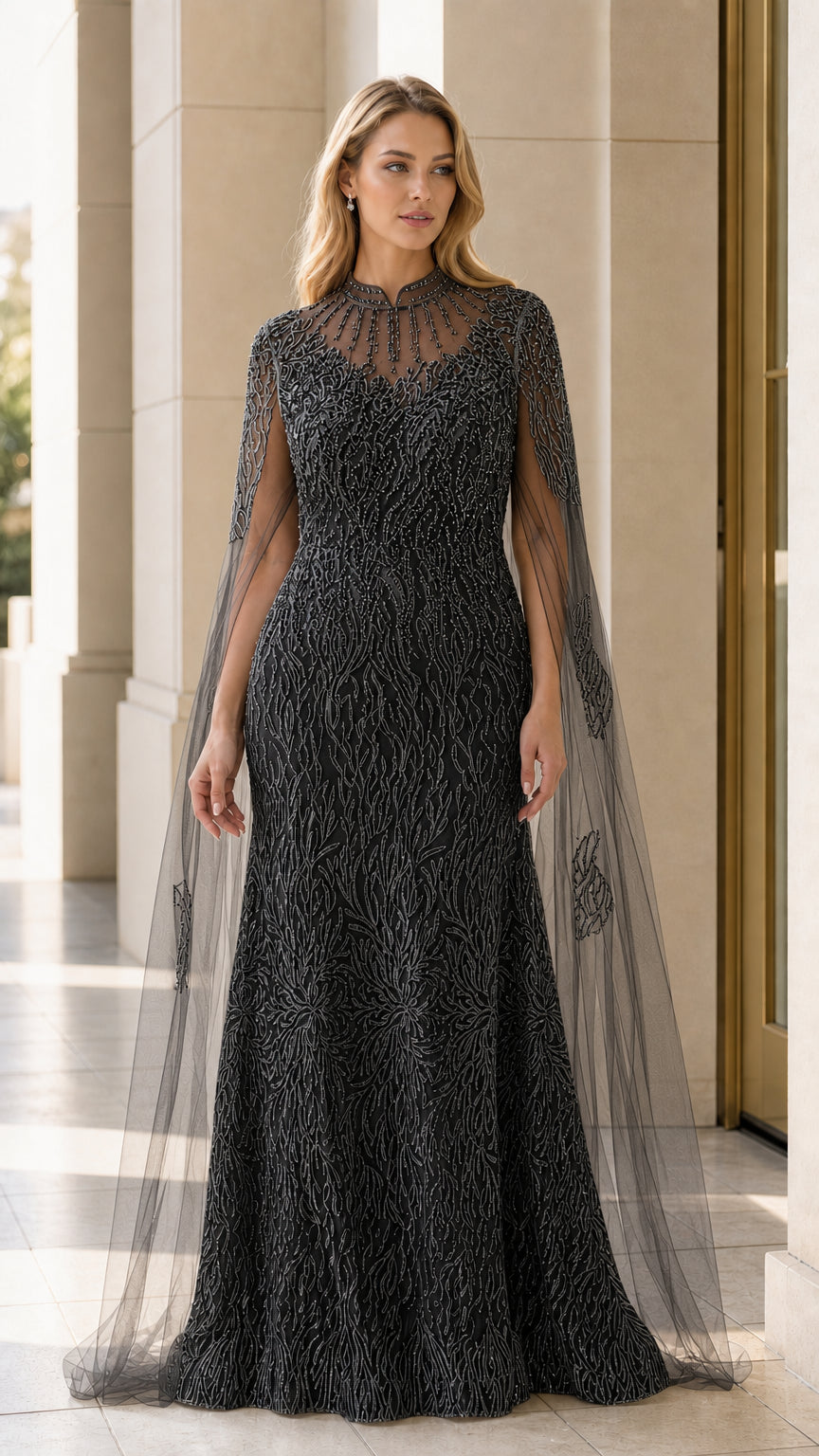 Full length black beaded formal evening gown with attached sheer cape