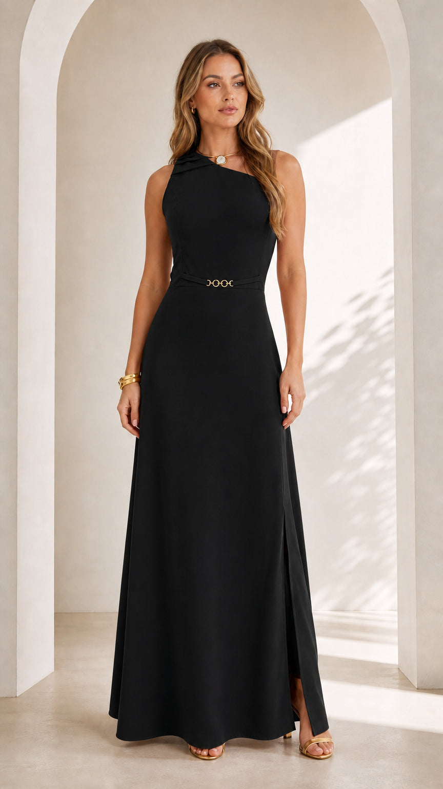Front full view of woman wearing classic black sleeveless asymmetrical maxi dress