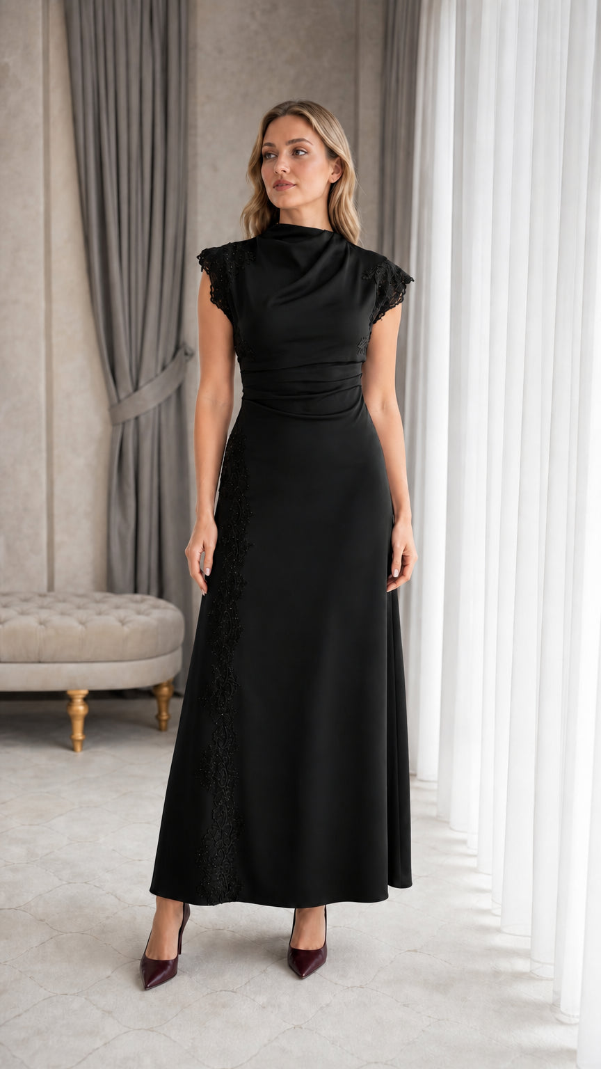 Full-length view of woman wearing black mock neck lace evening dress