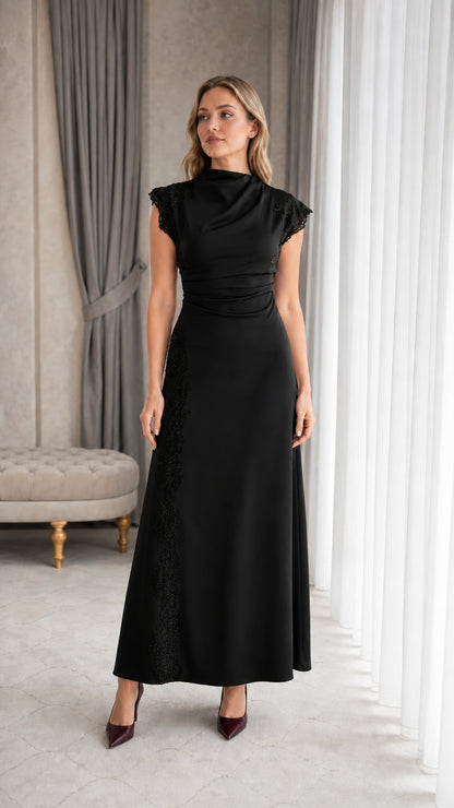 Full-length view of woman wearing black mock neck lace evening dress