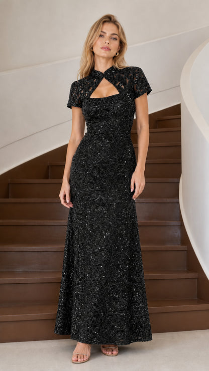 Black sequin embellished short sleeve evening gown front view