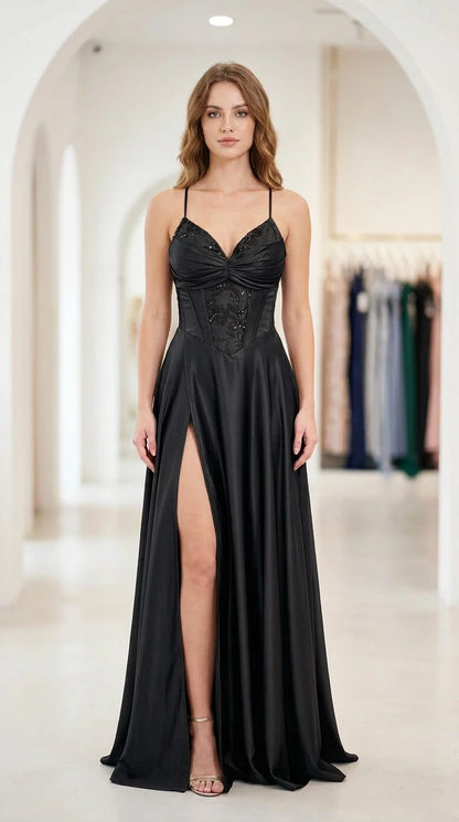 Front full-length view of black satin corset formal gown with high slit