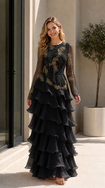Model wearing Black floral sequin embroidered tiered ruffle evening gown