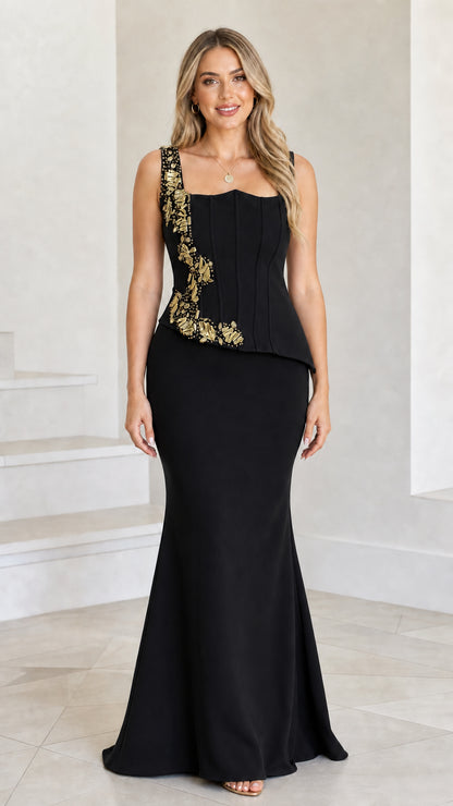 Front view of model wearing Black embellished corset mermaid evening gown