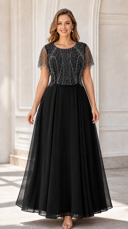Front view of model wearing black flutter sleeve beaded chiffon evening maxi dress