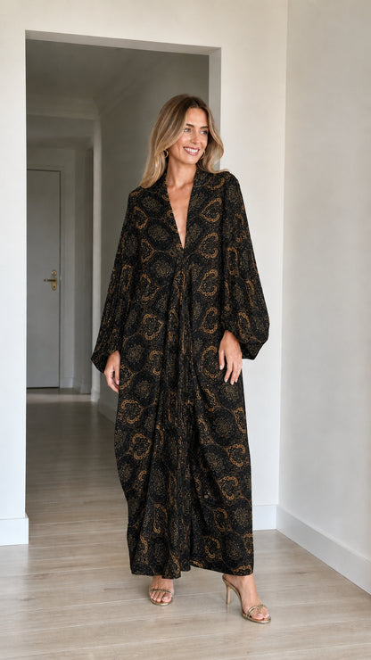 Model wearing Black paisley print long sleeve V-neck maxi kaftan dress