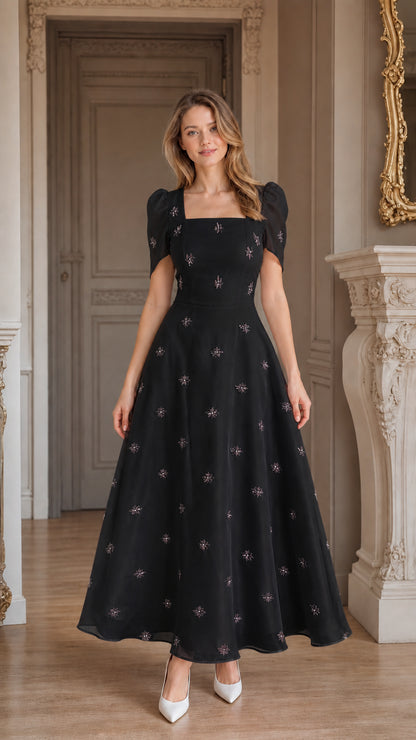 Front view of black embroidered square neck A-line midi dress