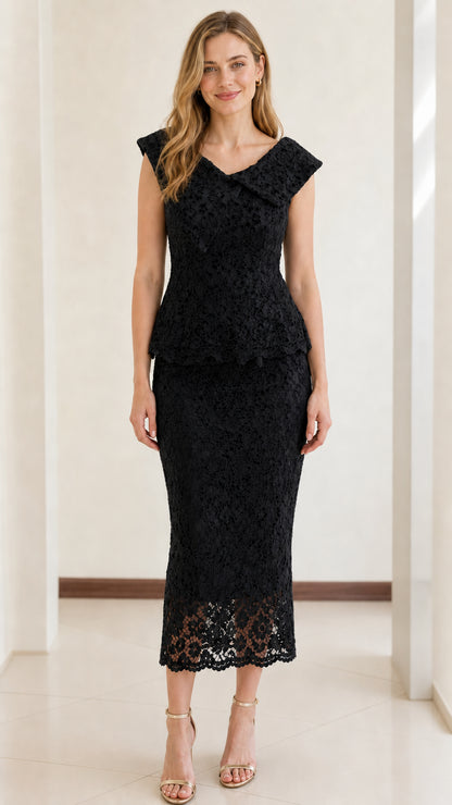 Front view of woman wearing black floral lace peplum midi dress