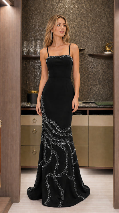 Front view of the evening gown in classic black with silver crystal embellishments