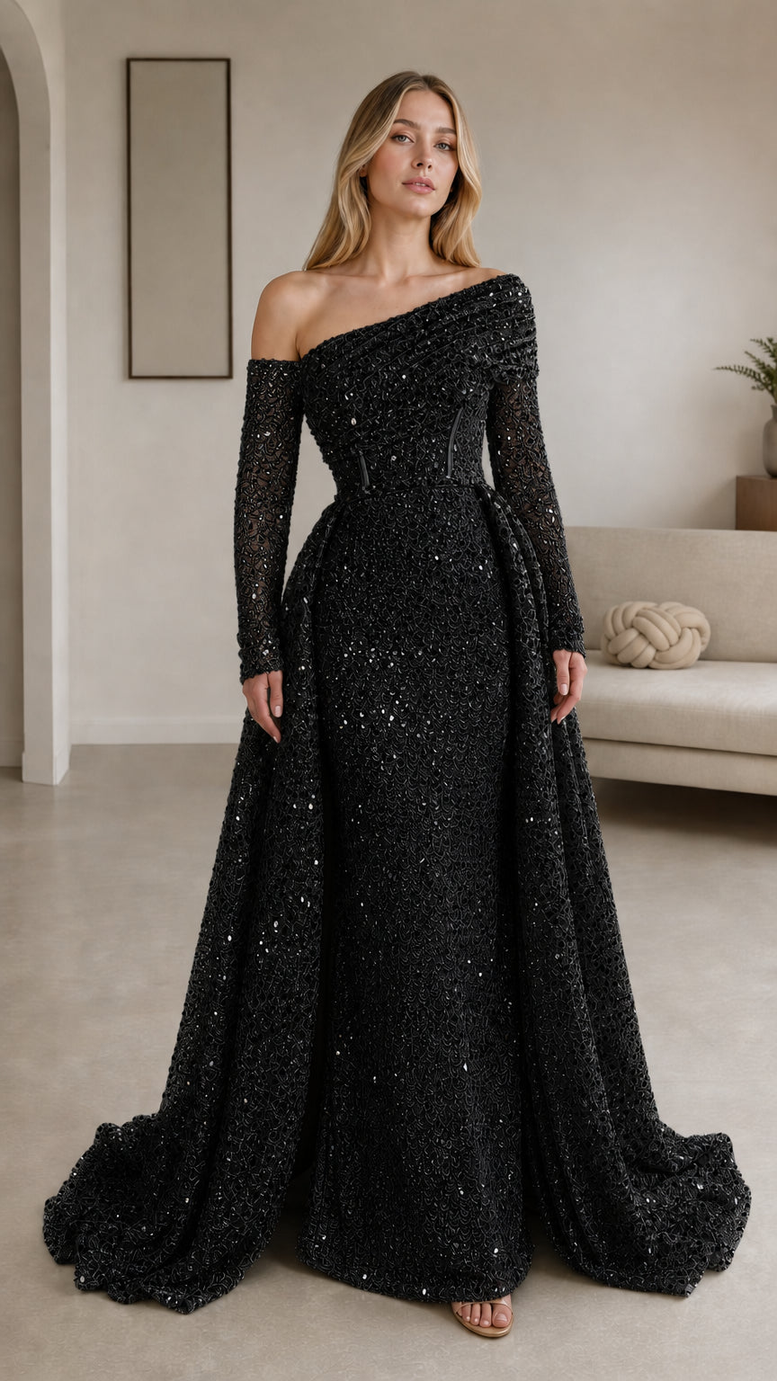 Black sequin asymmetrical long sleeve evening gown with overskirt