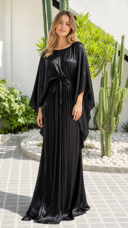 Model wearing Black pleated shimmer cape sleeve maxi kaftan dress