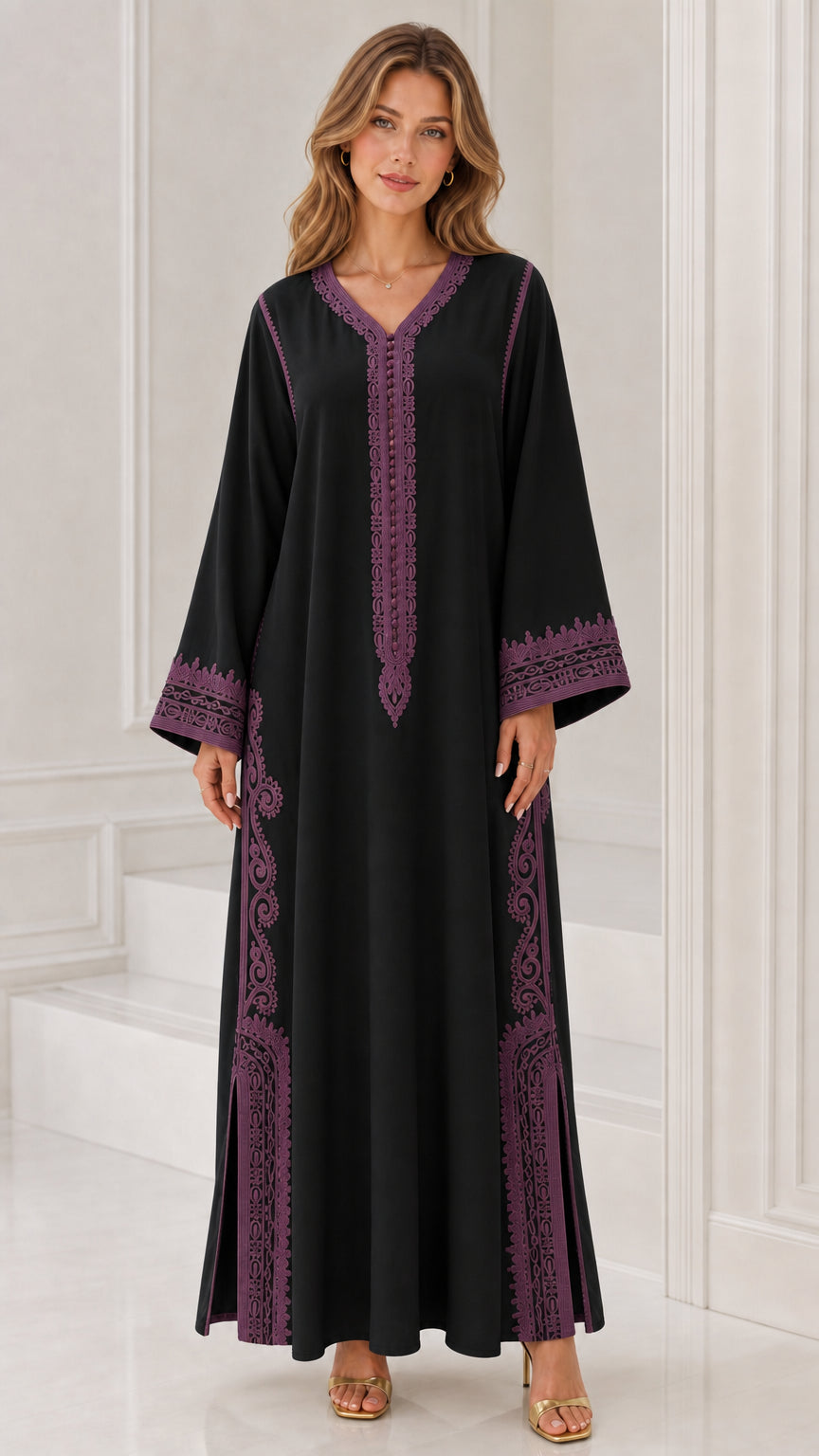 Front full view of woman wearing black kaftan dress with purple embroidery